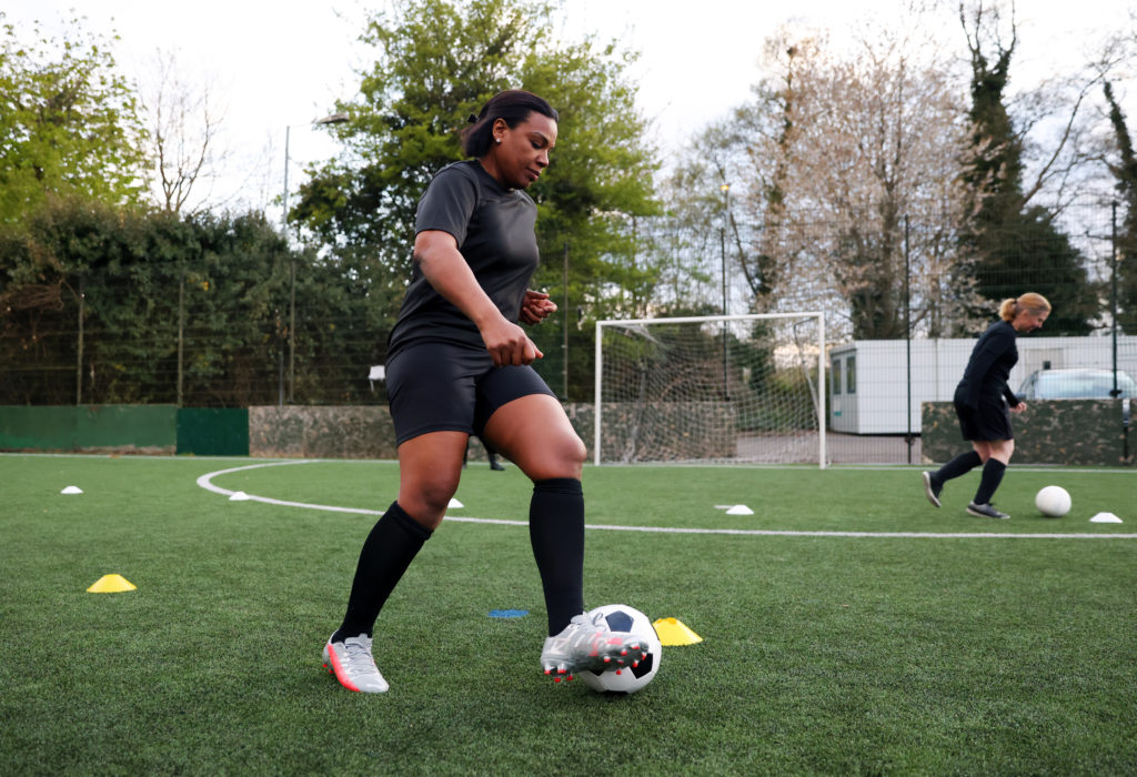 Women's football team train for football game