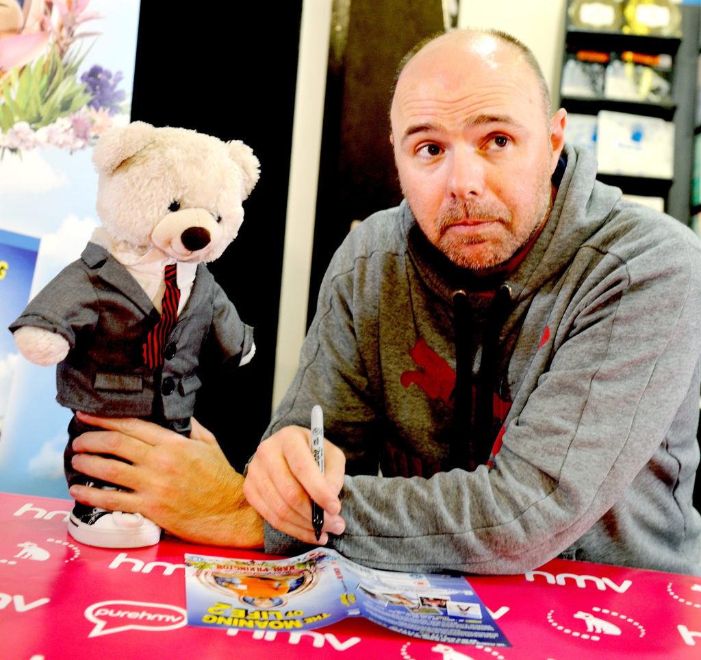 Karl Pilkington Signs Copies Of New DVD 'The Moaning Of Life 2'