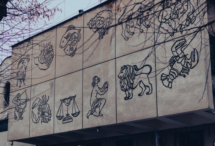 Zodiac signs on building elevation