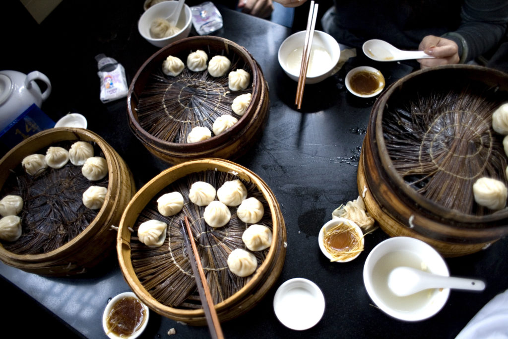 China - Shanghai - Food - Looking Down at a Table Full of Dumplings