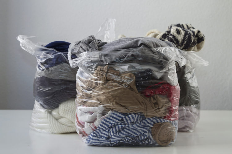 Everiday clothes in plastic bags