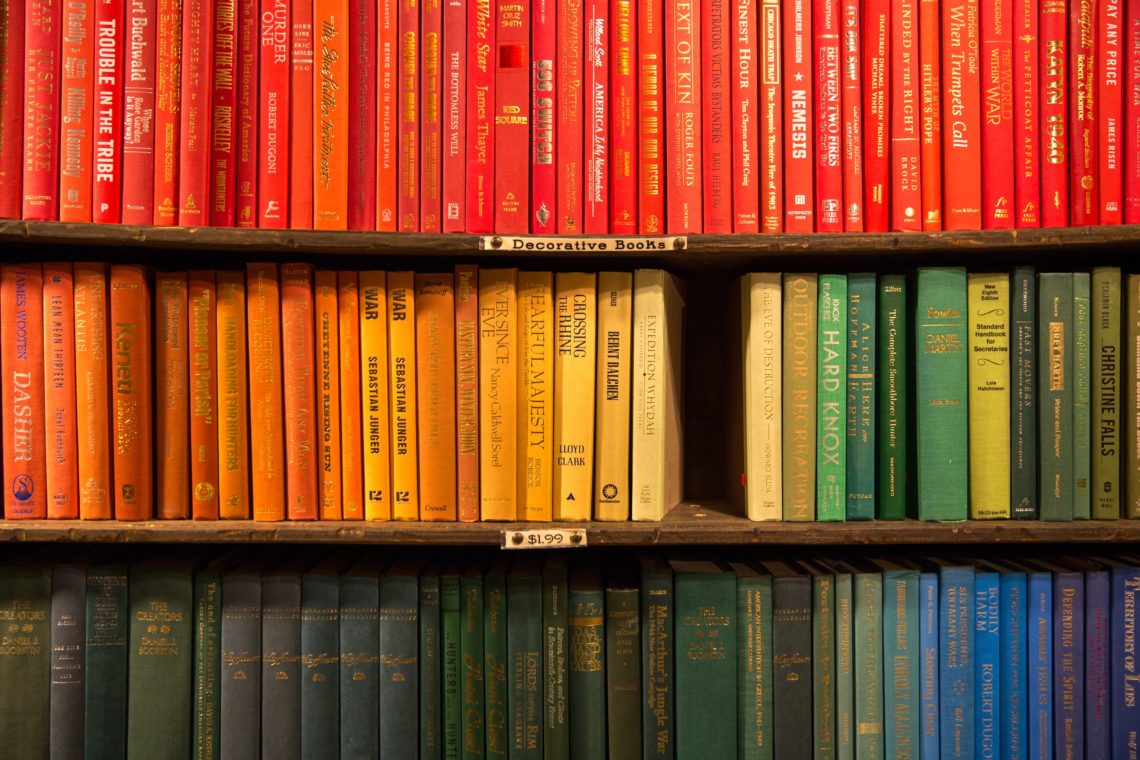 wooden bookcase filled with books