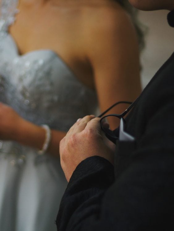 man and woman holding hands