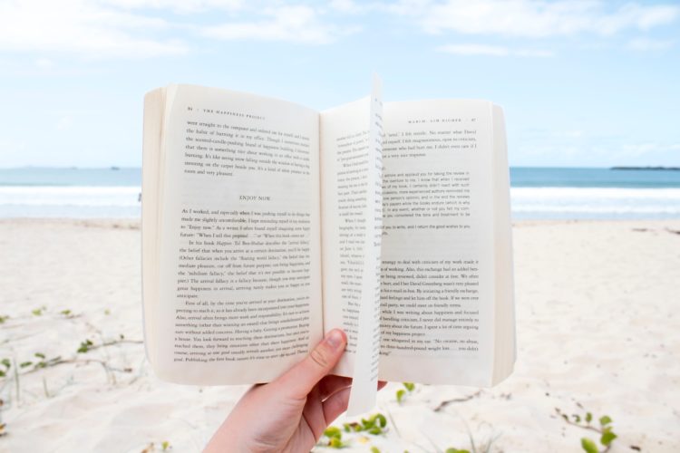 person holding book