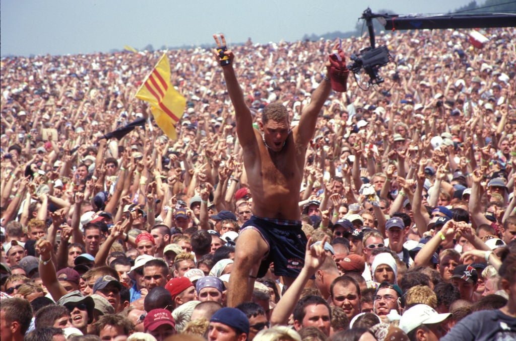 A Concert Fan Rising Above The Crowd At Woodstock 99