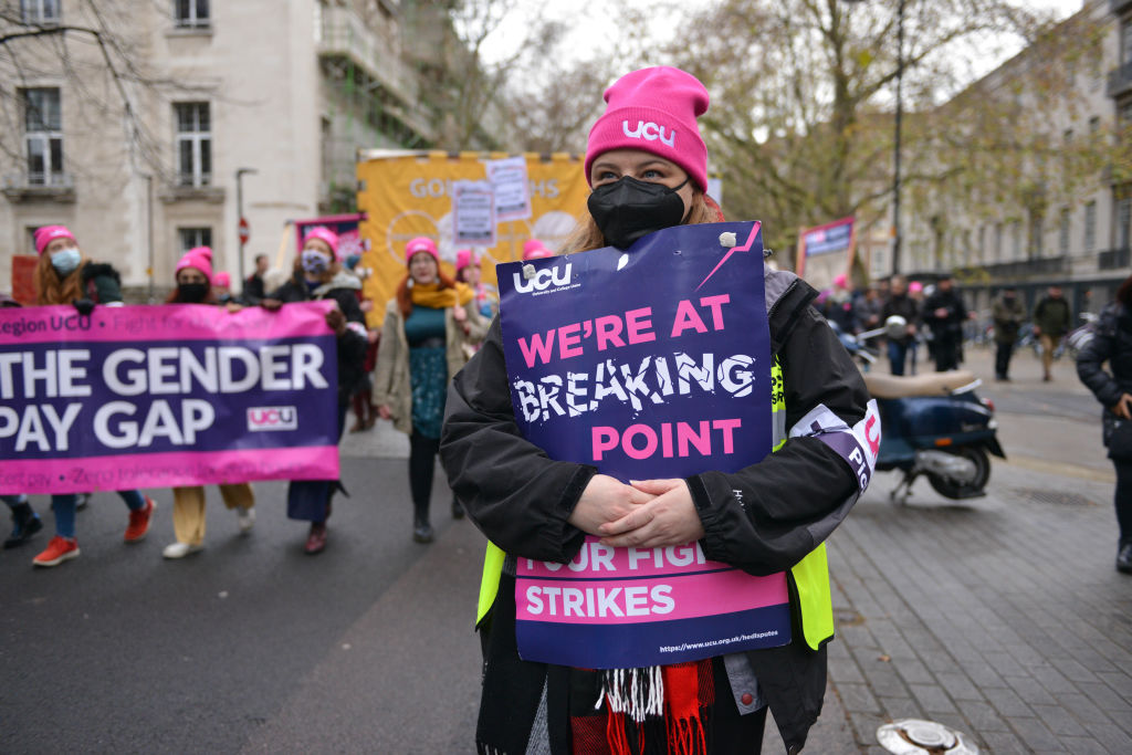 A protester seen with a placard during the demonstration.