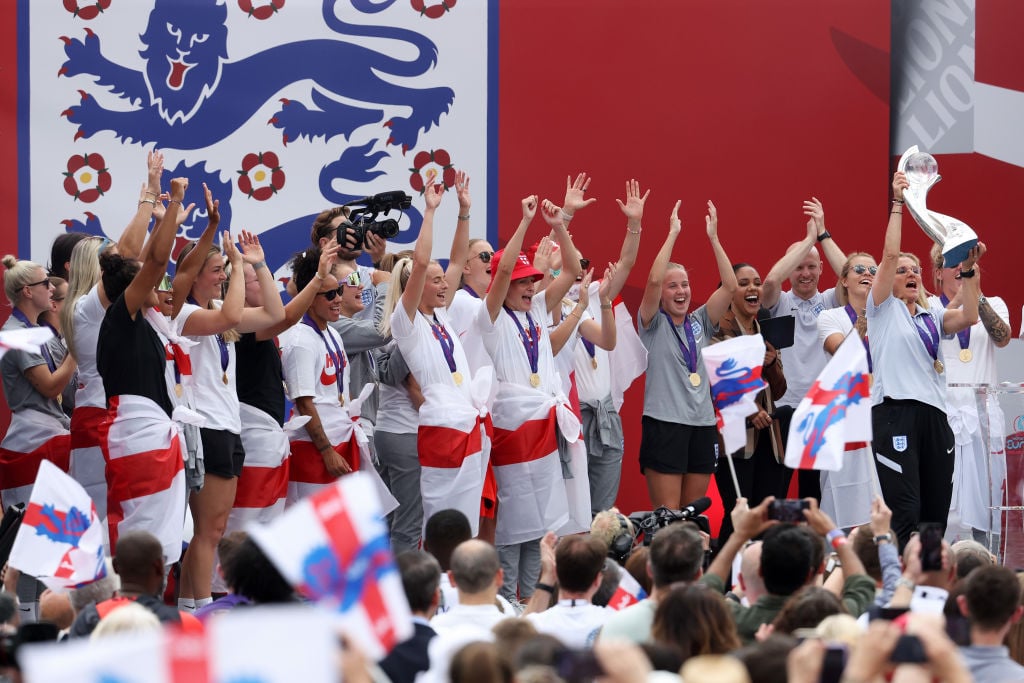 The Lionesses Lift The UEFA Women's Euro Trophy In Victory Celebration For Fans