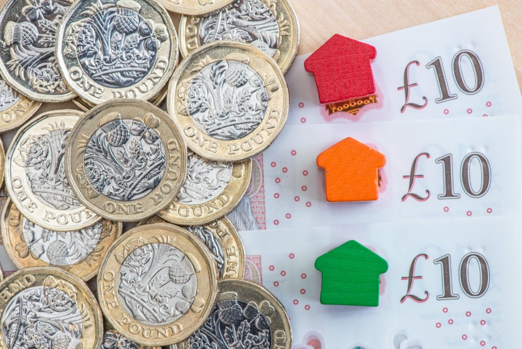 Traffic light colored model homes on £10 notes