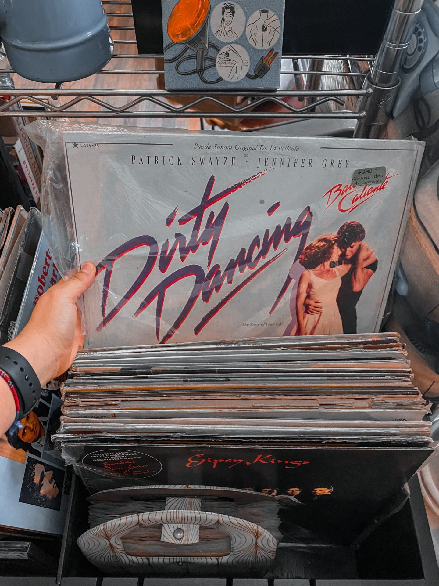 person holding white and black vinyl record
