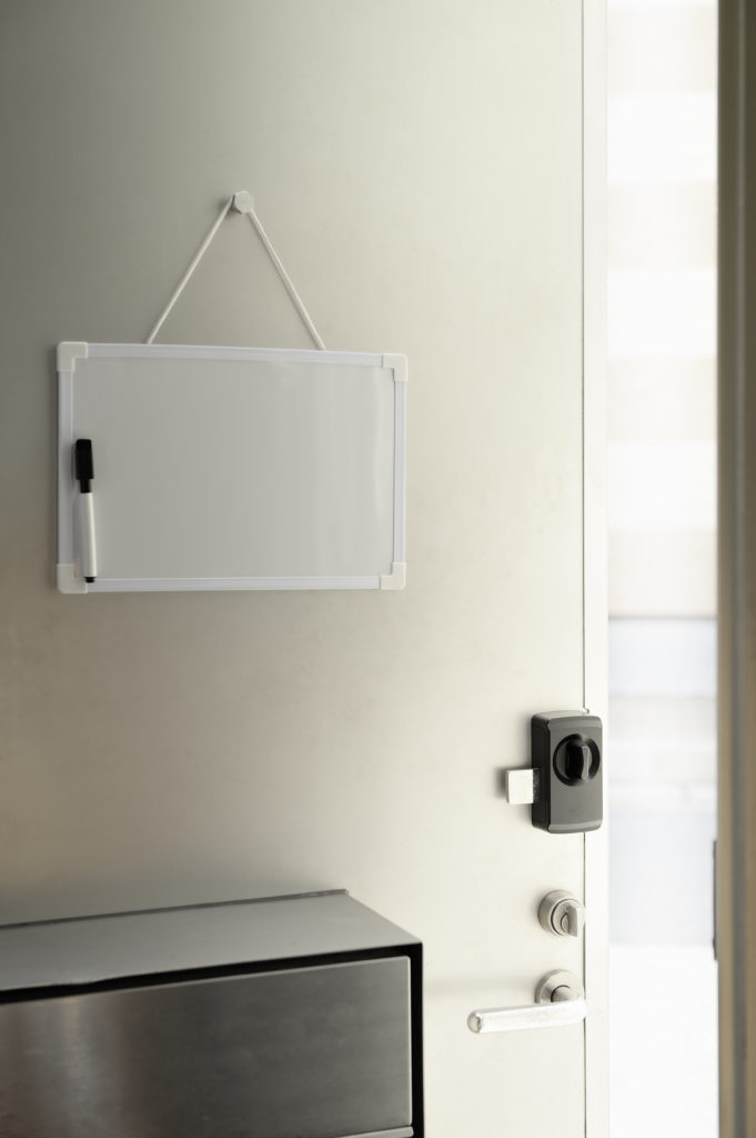 The whiteboard of the door of the entrance