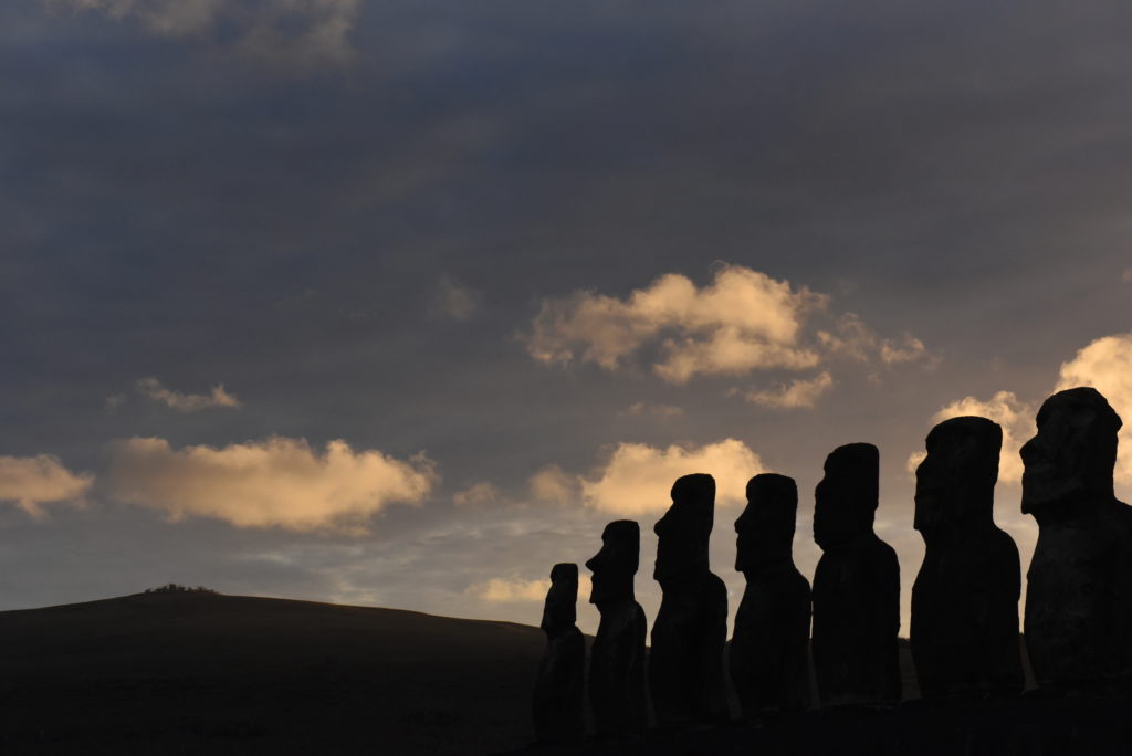 Silhouette of Moais at ceremonial platform Ahu Tongariki