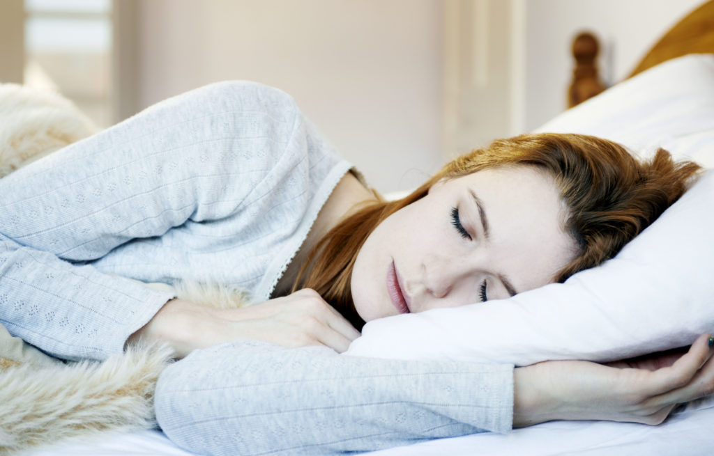 woman asleep in bed