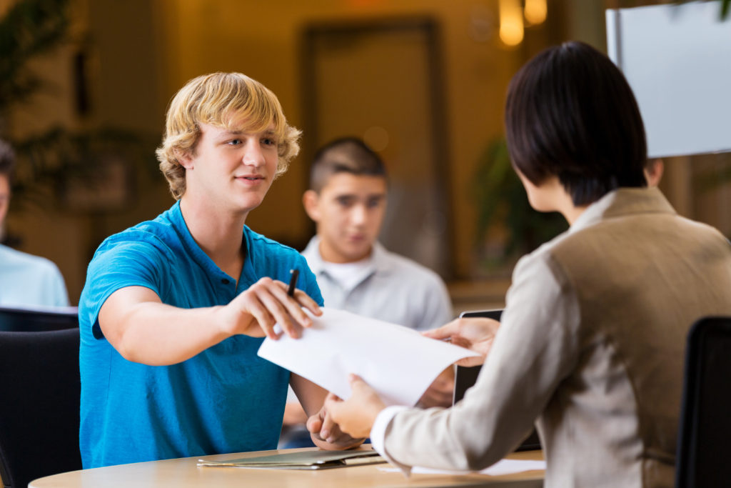 College student interviews at job fair