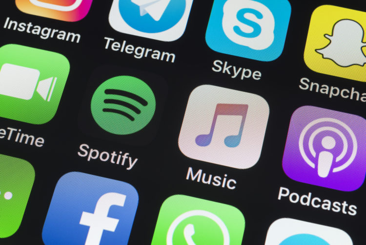 London, UK - July 19, 2018: The buttons of Spotify, Apple Music, Podcasts, Snapchat, Facebook, WhatsApp, Telegram, WeChat, Skype, telegram, WeChat ...