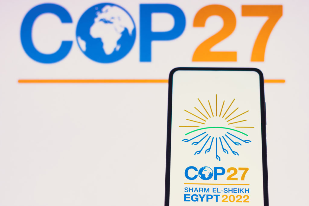 In this photo illustration, the 2022 United Nations Climate