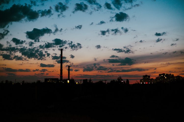 Dark sky over city