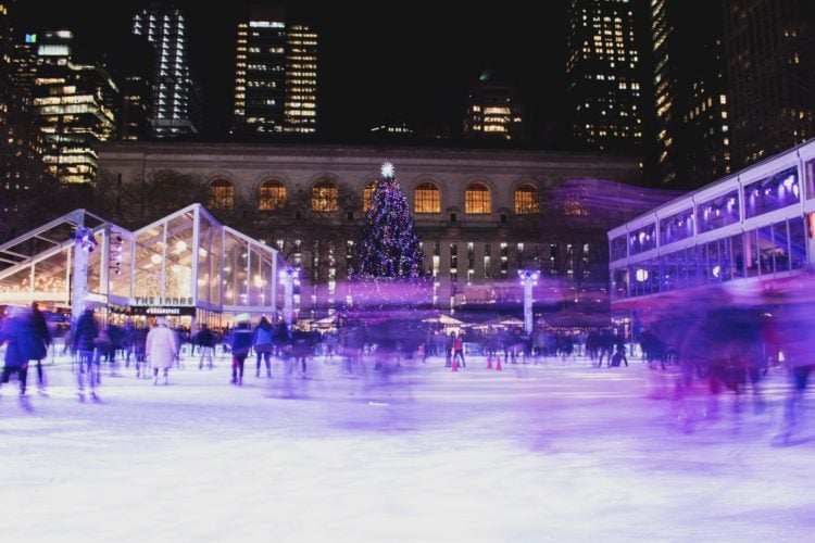 crowd on ice rink during night