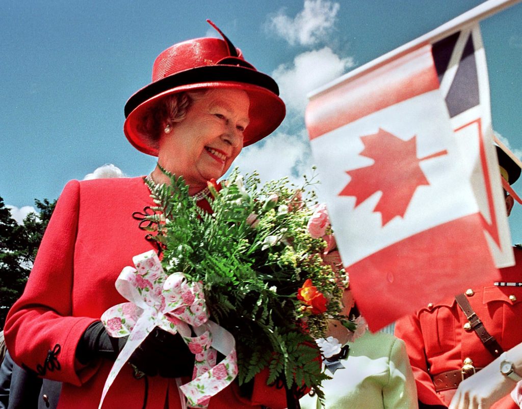 Queen Elizabeth II smiles as she visits Bowring Pa