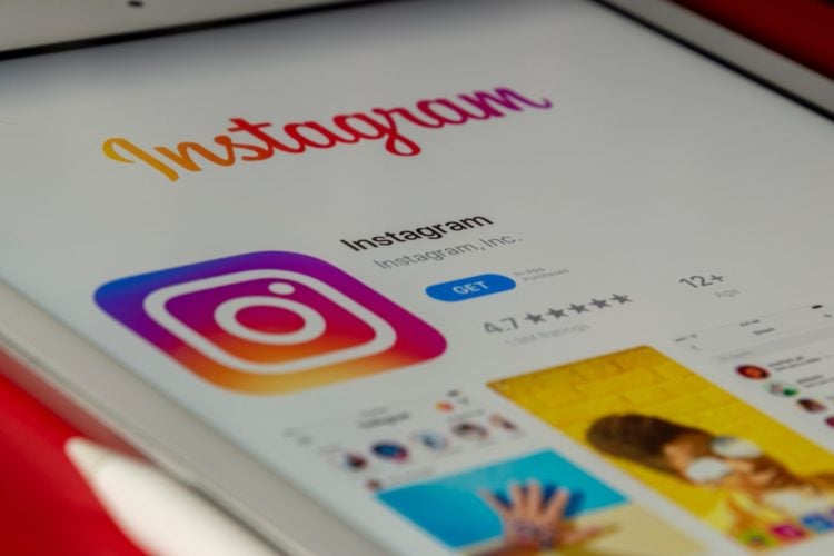 instagram download screen displayed on a white ipad
