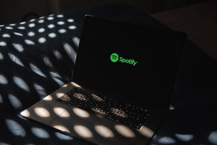 Listening to Spotify on a MacBook Pro