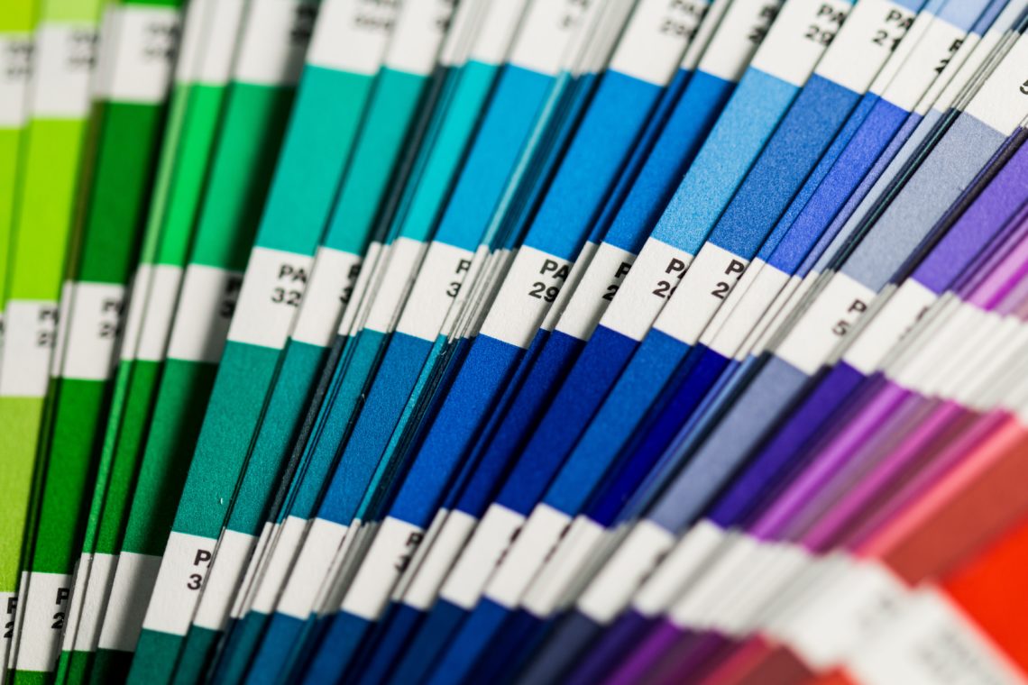 rainbow paint colours on multiple cards fanned out