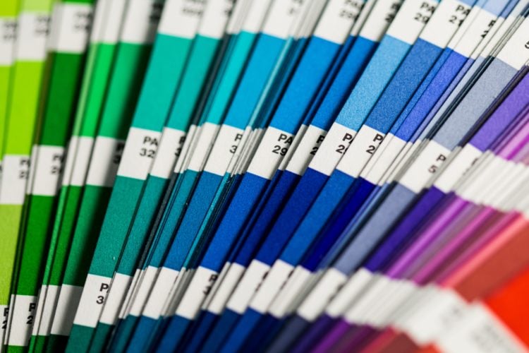 rainbow paint colours on multiple cards fanned out