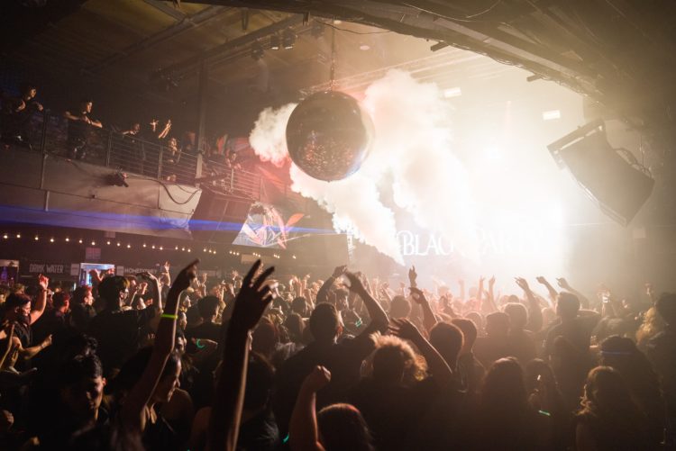 crowd of people at big nightclub