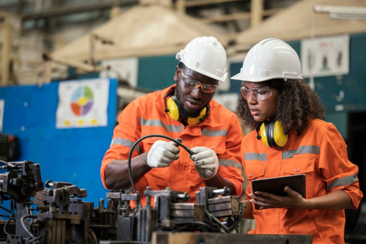 Alignment and assembly jigs developed to boost quality and efficiency in an auto parts manufacturing Industry. Two African American Process Enginee...