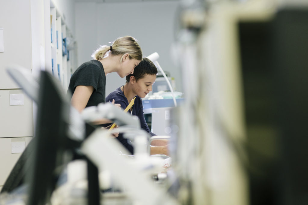 Two Female Technicians In Workshop