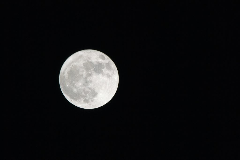 moon against back background