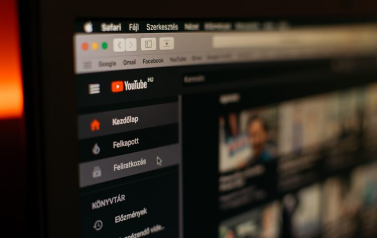 Youtube website in dark mode displayed on computer