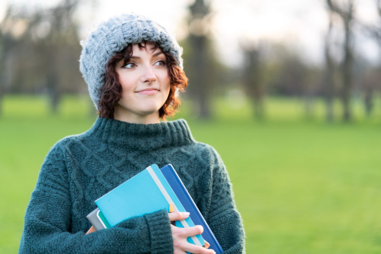 A smiling student in early Spring.