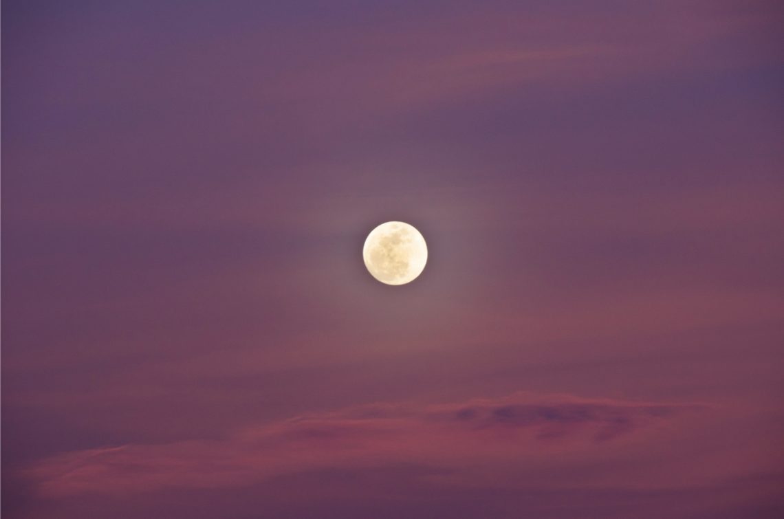full moon on purple sky
