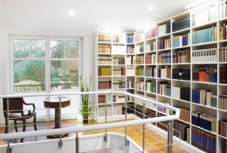 white wooden shelf with books
