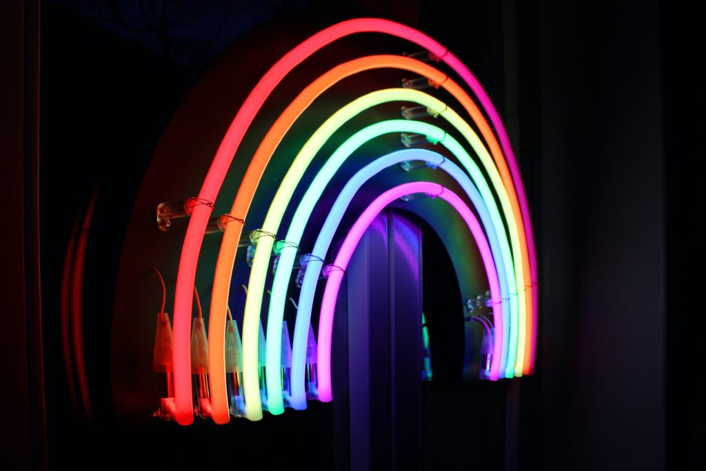 rainbow colored neon sign